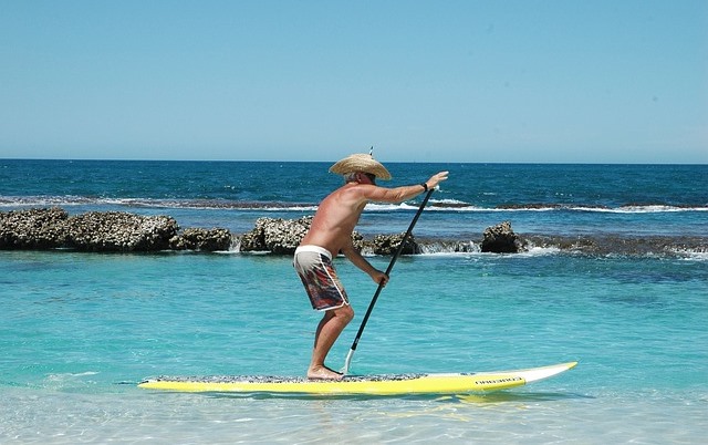 man on SUP boards